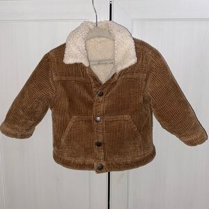 Brown and white reversible toddler unisex jacket worn twice by my child.